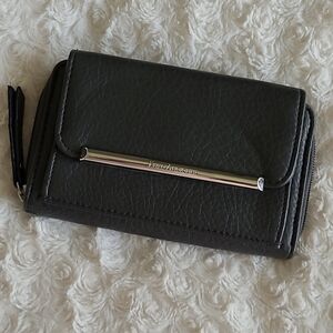 Enzo Angiolini dark gray wallet. Has change pocket & 6 card pockets inside.